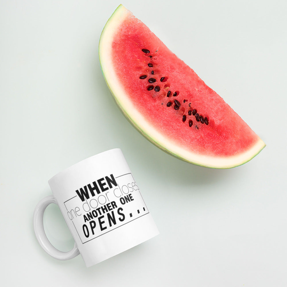 When One Door Closes Another One Opens White glossy mug Coffee Mug