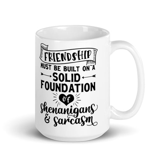 Friendship Must Be Built On White glossy mug